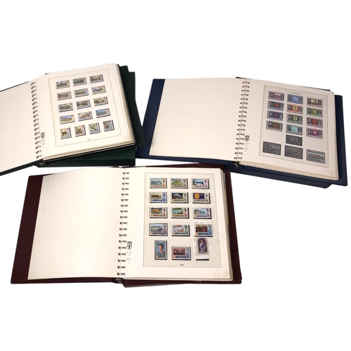 A COLLECTION OF ALBUMS CONTAINING BRITISH STAMPS FIRST DAY COVERS