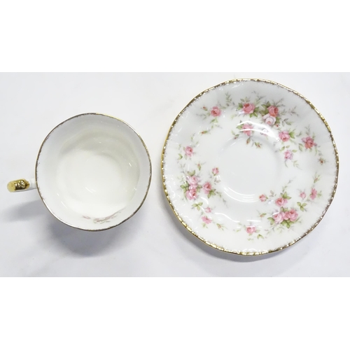 A Quantity Of Tea Dinner Wares In The Victoriana Rose Pattern To