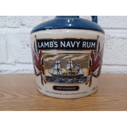 A 75cl Setton Pottery HMS Warrior Flagon Of Lamb S Navy Rum Bottled