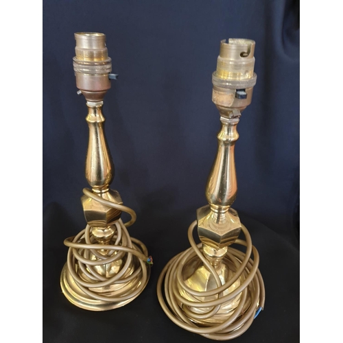 299 - Pair of brass light fittings