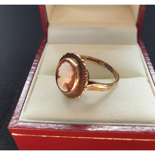 22 - 9ct gold Cameo ring, nice condition with ornate gold work surrounding the Cameo, weight approx 3.1g ... 