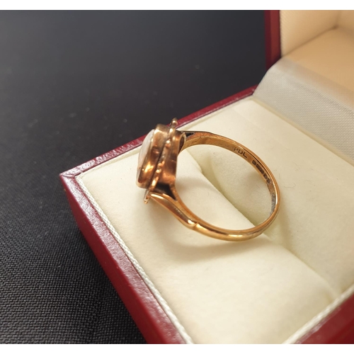 22 - 9ct gold Cameo ring, nice condition with ornate gold work surrounding the Cameo, weight approx 3.1g ... 
