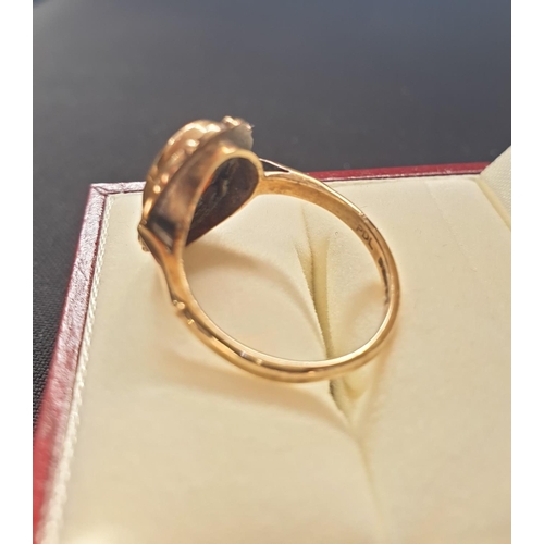 22 - 9ct gold Cameo ring, nice condition with ornate gold work surrounding the Cameo, weight approx 3.1g ... 