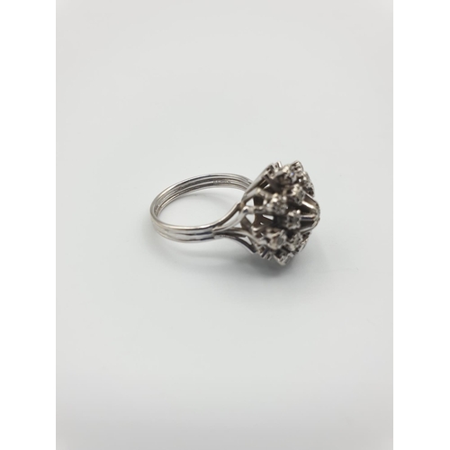 41 - 18CT WHITE GOLD DIAMOND CLUSTER RING, SIZE M WEIGHT 6.2G. Hallmark inside the band showing 750 for 1... 