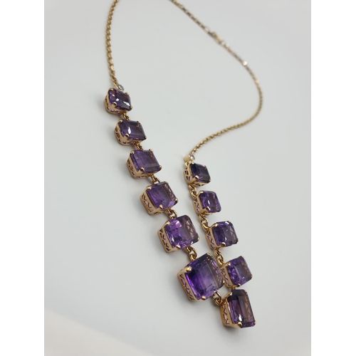 56 - 9CT YELLOW GOLD AMETHYST NECKLACE, Size of the biggest stone is 11 x 9ml .WEIGHT 15.8G AND 40CM LENG... 