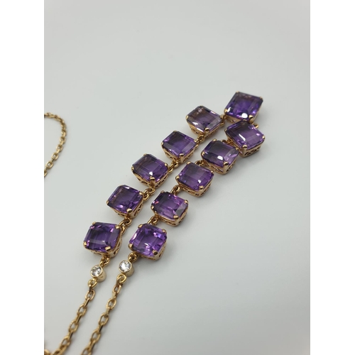 56 - 9CT YELLOW GOLD AMETHYST NECKLACE, Size of the biggest stone is 11 x 9ml .WEIGHT 15.8G AND 40CM LENG... 