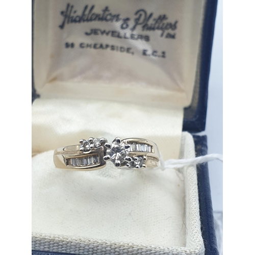 17 - Yellow gold with 0.15ct diamond ring in claw setting flanked by small shoulder stones, weight 3.93g ... 