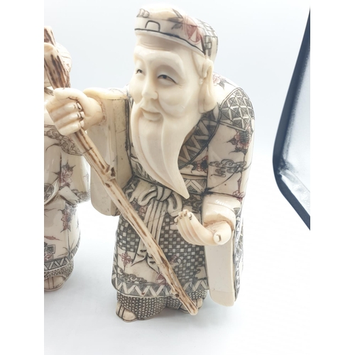 42 - 1910 Antique pair of large Japanese Okimono bone and 
 ivory figures, 20cm tall