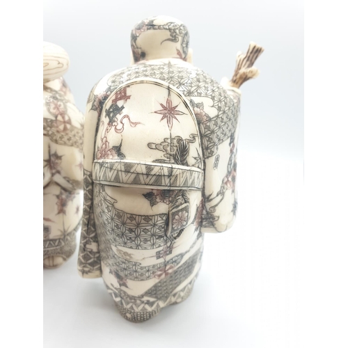 42 - 1910 Antique pair of large Japanese Okimono bone and 
 ivory figures, 20cm tall
