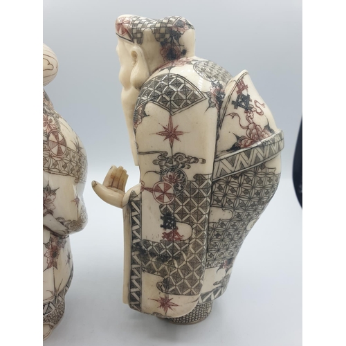 42 - 1910 Antique pair of large Japanese Okimono bone and 
 ivory figures, 20cm tall