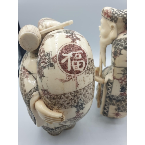 42 - 1910 Antique pair of large Japanese Okimono bone and 
 ivory figures, 20cm tall