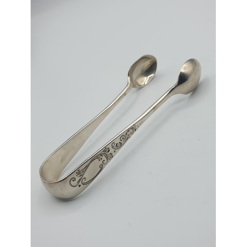 242 - Antique silver pair of sugar nips, hallmark showing Sutherland and Roden Sheffield 1906, length 9cm ... 