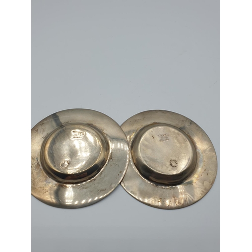 257 - Pair of silver dip dishes, coaster size with ornate borders, central American, base showing Silver 9... 