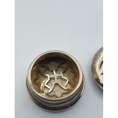 261 - Unusual small silver round pill box with faces on the lid