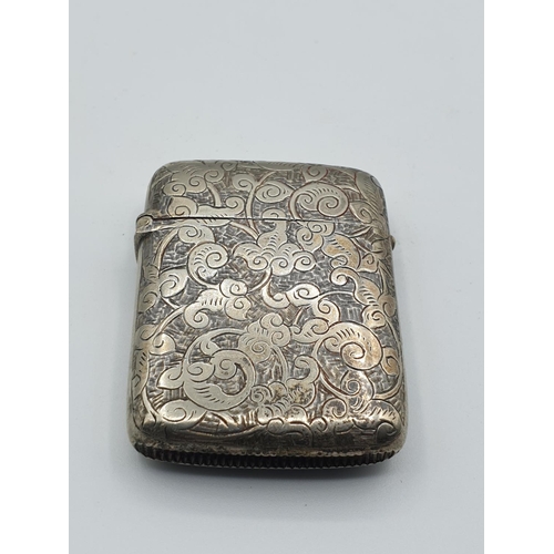 272 - Vintage white metal vesta circa 1910 with hand engraved front