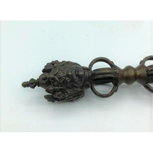 252 - Antique Oriental ceremonial dagger. 3 faces on hilt 10.9oz. 23cms in length