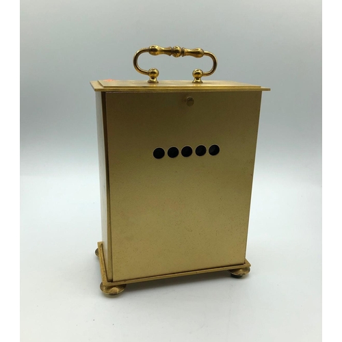 256 - Avia carriage clock in yellow metal. With pendulum, roman numerals, battery operated. W 12.3cm x L 1... 