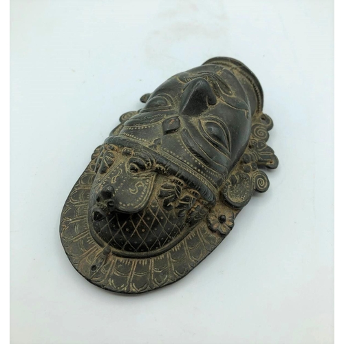 258 - Antique miniature ceremonial oriental metal mask 15.6oz
13.5cm in length