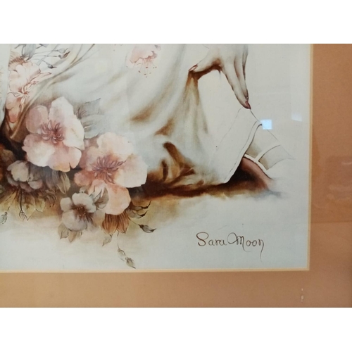 262 - A painting frame of Sara Moon in yellow metal frame. W37.5cmx L47.8cm