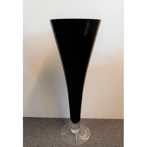 273 - Large black glass floor vase, Tapered cone shape with clear base.L59.3cm