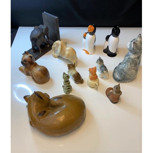 291 - Assorted animal figures in include 10 pussies and 2 elephants