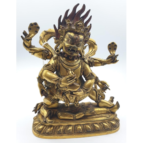A very early gilded bronze figure of an Oriental dragon god, 19cm tall and weight 1700g.
Gilding is in generally good condition for age.