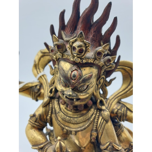 27 - A very early gilded bronze figure of an Oriental dragon god, 19cm tall and weight 1700g.
Gilding is ... 
