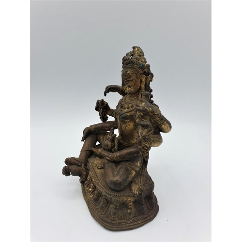 29 - A very early gilded bronze figure of an Oriental 6 arm Goddess, 14cm tall and weighing 1139g.