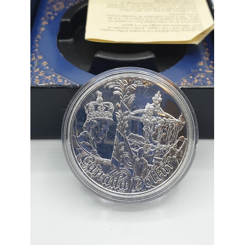 308 - A Canadian silver dollar from 2002 ,issued by the royal Canadian mint to celebrate the Golden Jubile... 