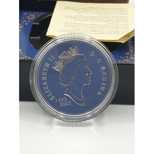308 - A Canadian silver dollar from 2002 ,issued by the royal Canadian mint to celebrate the Golden Jubile... 
