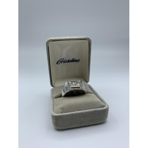 310 - 14ct white gold ring with diamonds (approx 0.72ct), weight 8.7g and size V