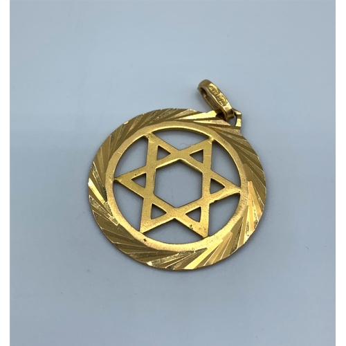 117 - An 18ct yellow Gold Star of David Pendant with ornate surround, weight 3.8g approx