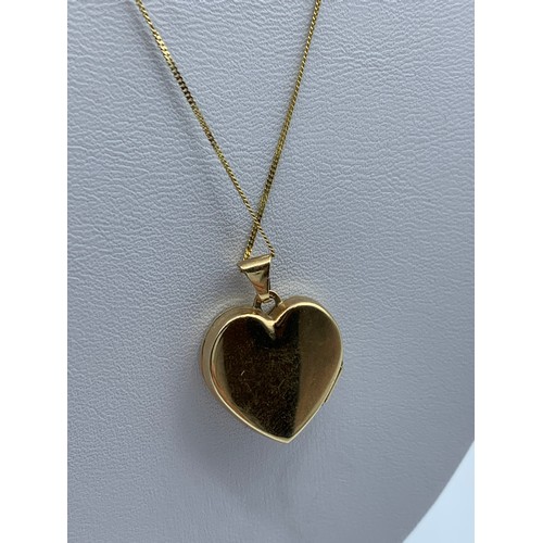 Sold at Auction: A 9K Yellow Gold Heart Locket Pendant on a 9K