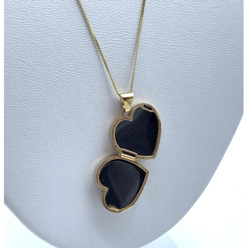 Sold at Auction: A 9K Yellow Gold Heart Locket Pendant on a 9K