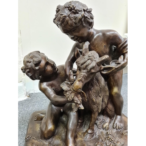 78 - A late 19th century French Bronze Statue of two boys feeding a goat, 35x30x21cm and weight 10.2kg