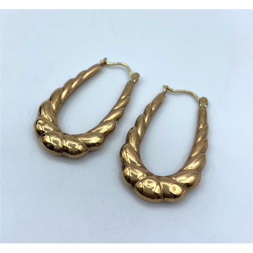 55 - Pair of Yellow Metal horseshoe shaped Earrings, weight 1.6g and 3cm long approx