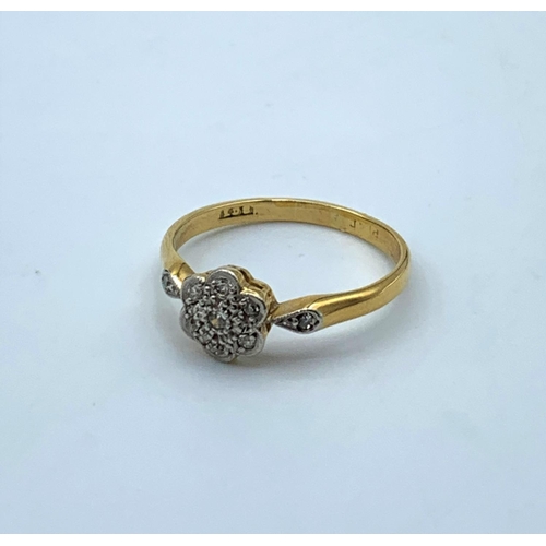 63 - Vintage Diamond Floral Ring set in Platinum and 18CT yellow Gold, size M and weight 2.35g approx