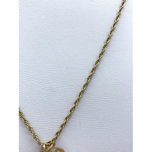 73 - 9CT Yellow gold St Christopher and '18 key' Pendants on 48cm long 9ct gold chain, weight 5.5g approx