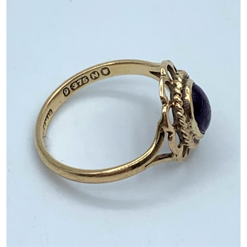 75 - Vintage 9CT yellow Gold Ring with purple stone centre, size H and weight 1.7g approx