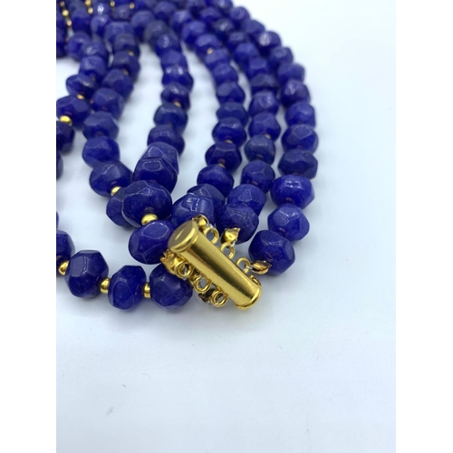 225 - A 3 row Lapis Lazuli Necklace with faceted Lapis Lazuli beads and gold plated spacer Beads and clasp... 