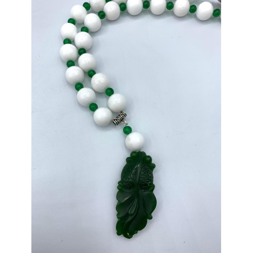 229 - Chinese White and Green Jade Necklace and Earrings set, weight 178g