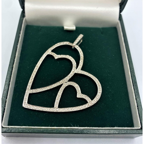 324 - 18CT WHITE GOLD DIAMOND SET OPEN HEART PENDANT, WEIGHT 5.9G AND 0.50CT DIAMOND APPROX, 5CM LONG