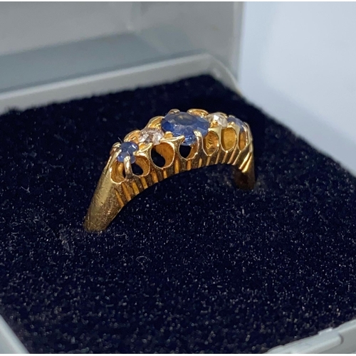 325 - 18CT YELLOW GOLD VINTAGE DIAMOND AND SAPPHIRE TRILOGY RING, WEIGHT 2.9G AND 1900 HALLMARK INSIDE BAN... 