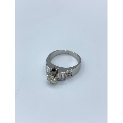 350 - 18ct white gold ring with 0.40ct diamond centre and more diamond on the shoulders (total approx 1.1c... 