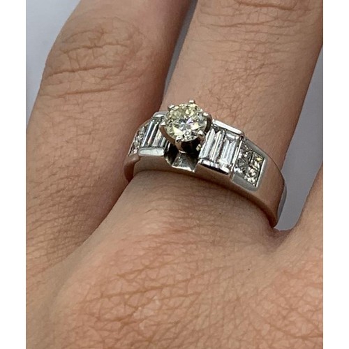 350 - 18ct white gold ring with 0.40ct diamond centre and more diamond on the shoulders (total approx 1.1c... 