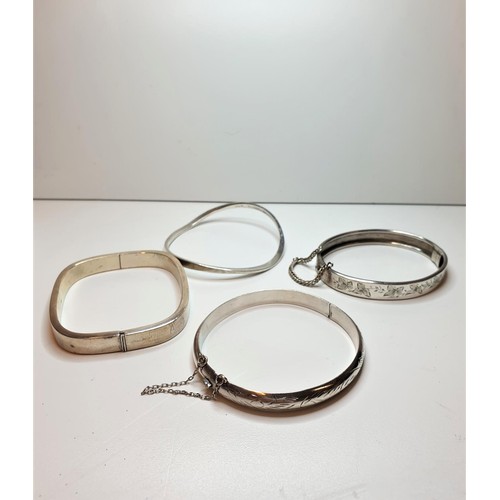 306 - 4 Assorted Silver Bangles, weight 51g (4)