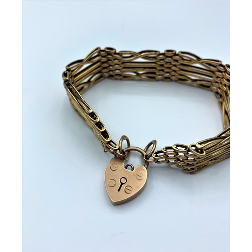 328 - Vintage 9ct Rose Gold gate Bracelet with padlock catch, weight 20.7g and 18cm long approx