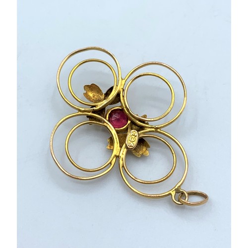 108 - 9CT Yellow Gold Vintage Pendant with red stone centre, 3cm long and weight 1.5g approx