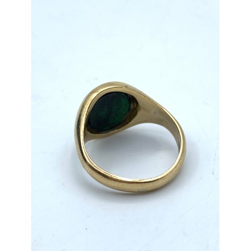 120 - Vintage 9K Yellow Gold Mens Ring with Green stone centre, size N1/2 and weight 5.5g approx