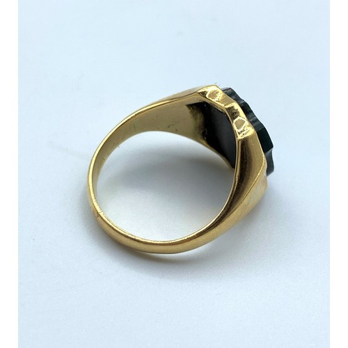 122 - Vintage 18K Yellow Gold mens Ring with Black stone centre, size M and weight 6.2g approx